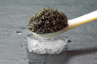 black caviar on spoon